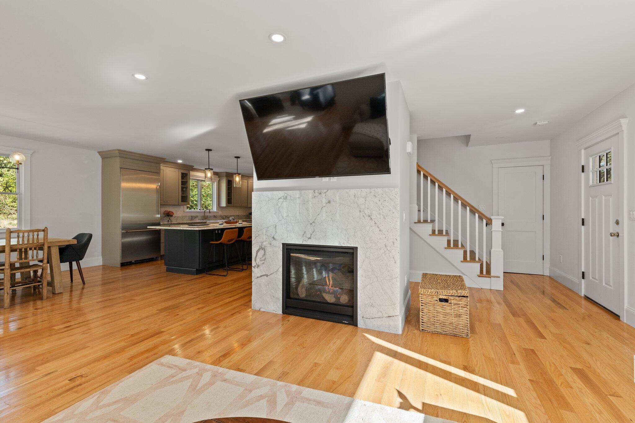 12 Jonathan Lane Sandwich, MA 02563 - Photo 11 of 57 a living room with furniture fireplace and flat screen tv