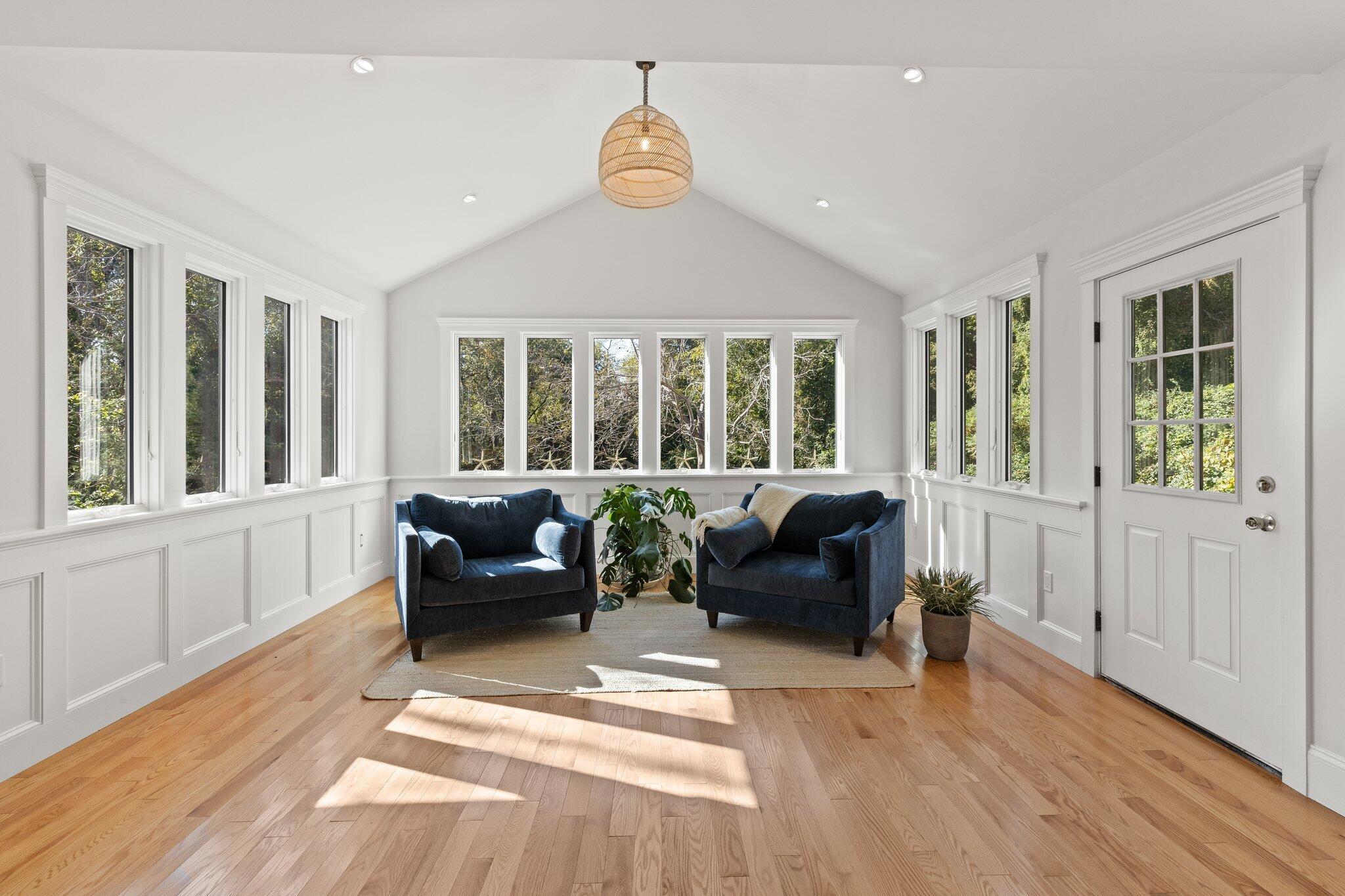 12 Jonathan Lane Sandwich, MA 02563 - Photo 14 of 57 a living room with furniture and windows