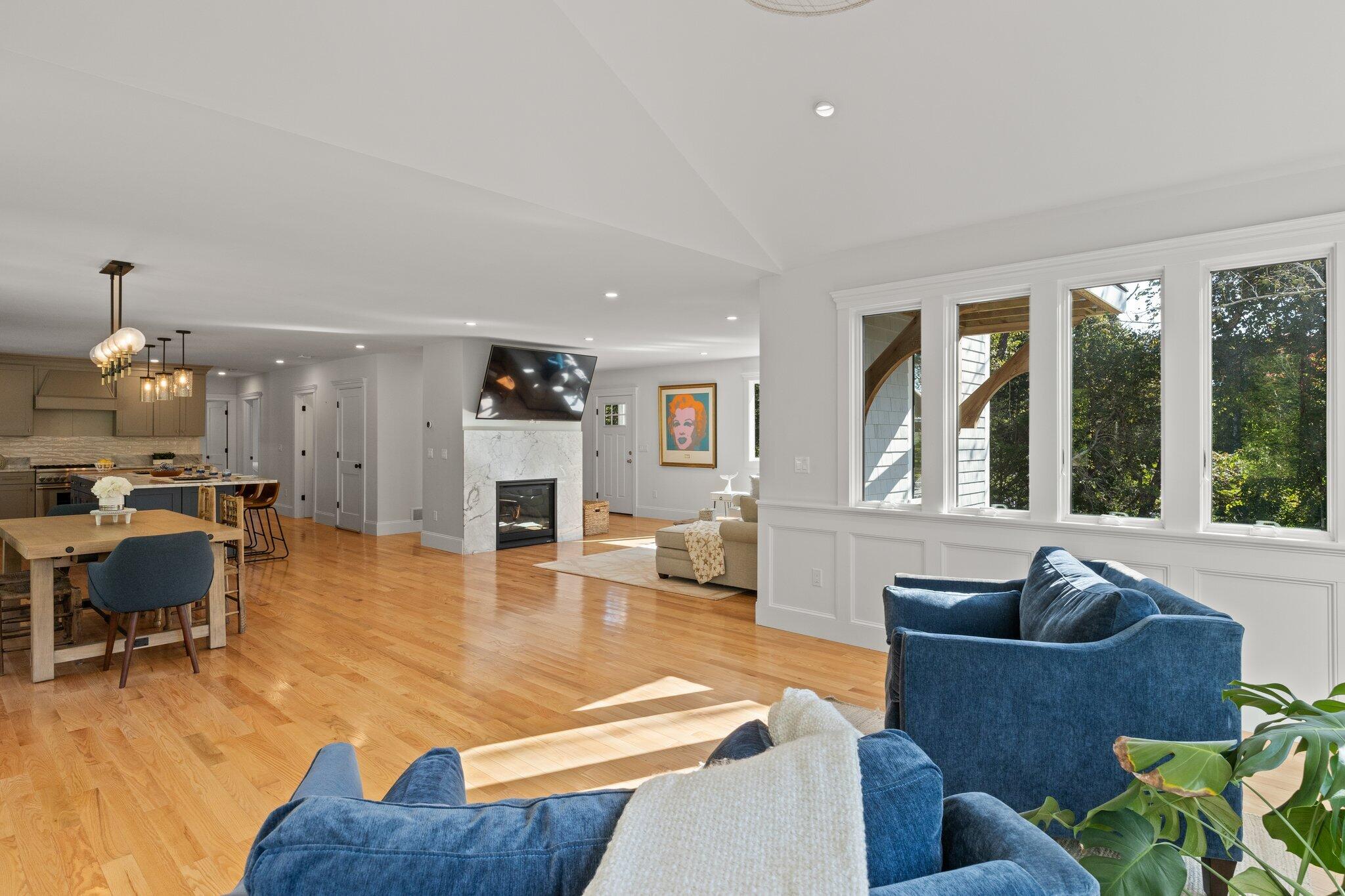 12 Jonathan Lane Sandwich, MA 02563 - Photo 16 of 57 a living room with furniture and a large window