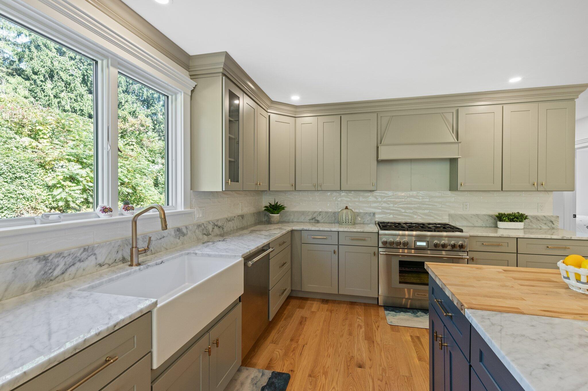 12 Jonathan Lane Sandwich, MA 02563 - Photo 23 of 57 a kitchen with a sink stove and cabinets
