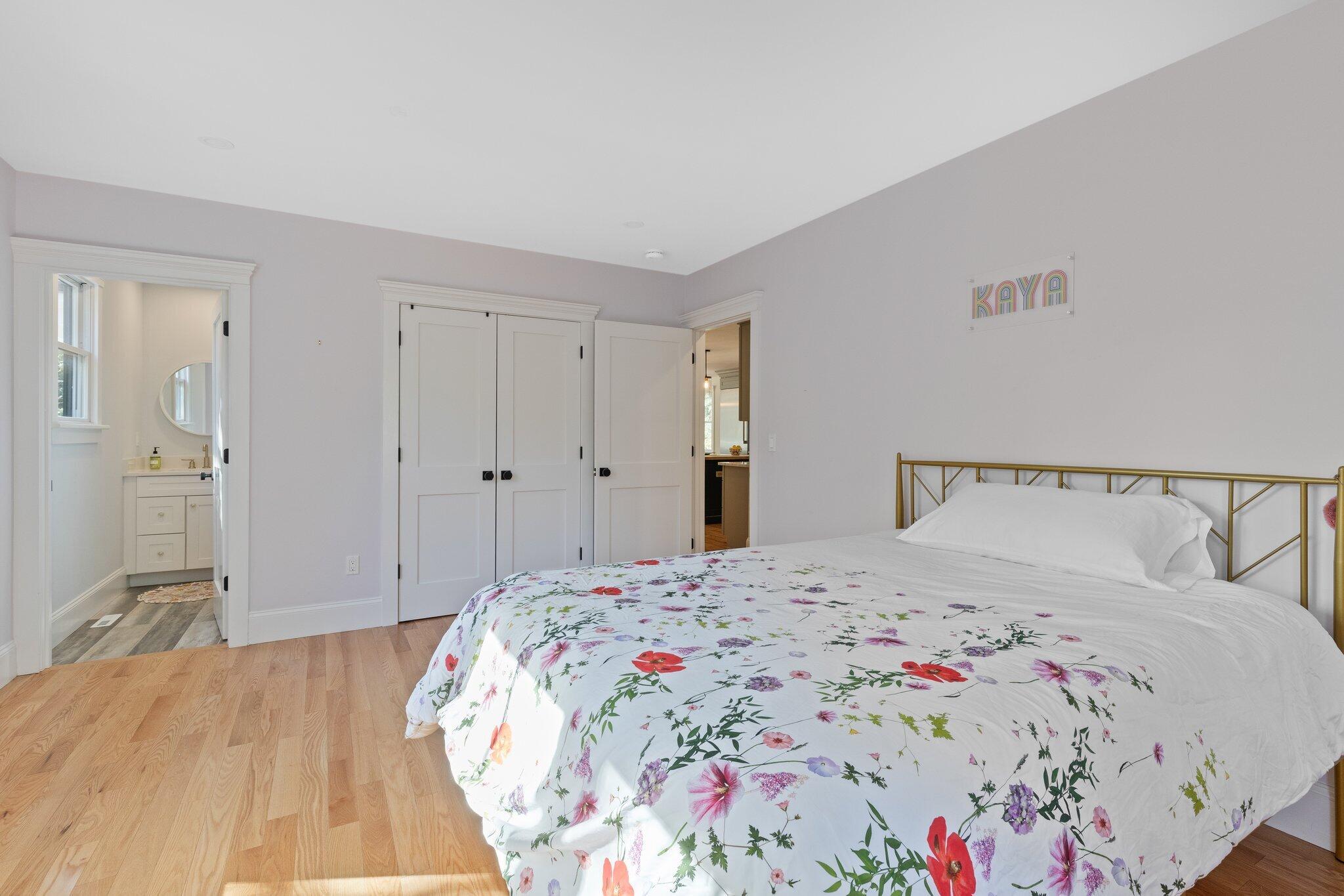 12 Jonathan Lane Sandwich, MA 02563 - Photo 28 of 57 a bedroom with a bed and a dresser