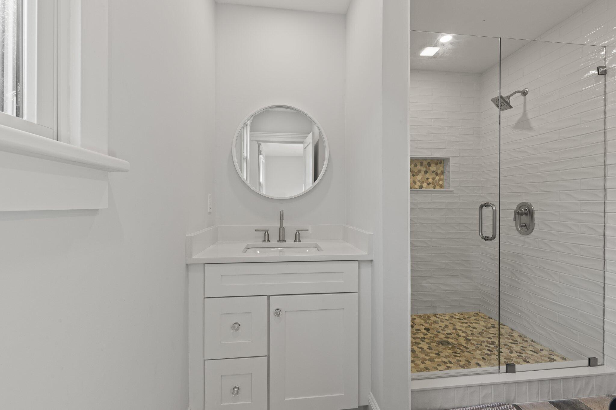 12 Jonathan Lane Sandwich, MA 02563 - Photo 29 of 57 a bathroom with a sink a toilet and shower