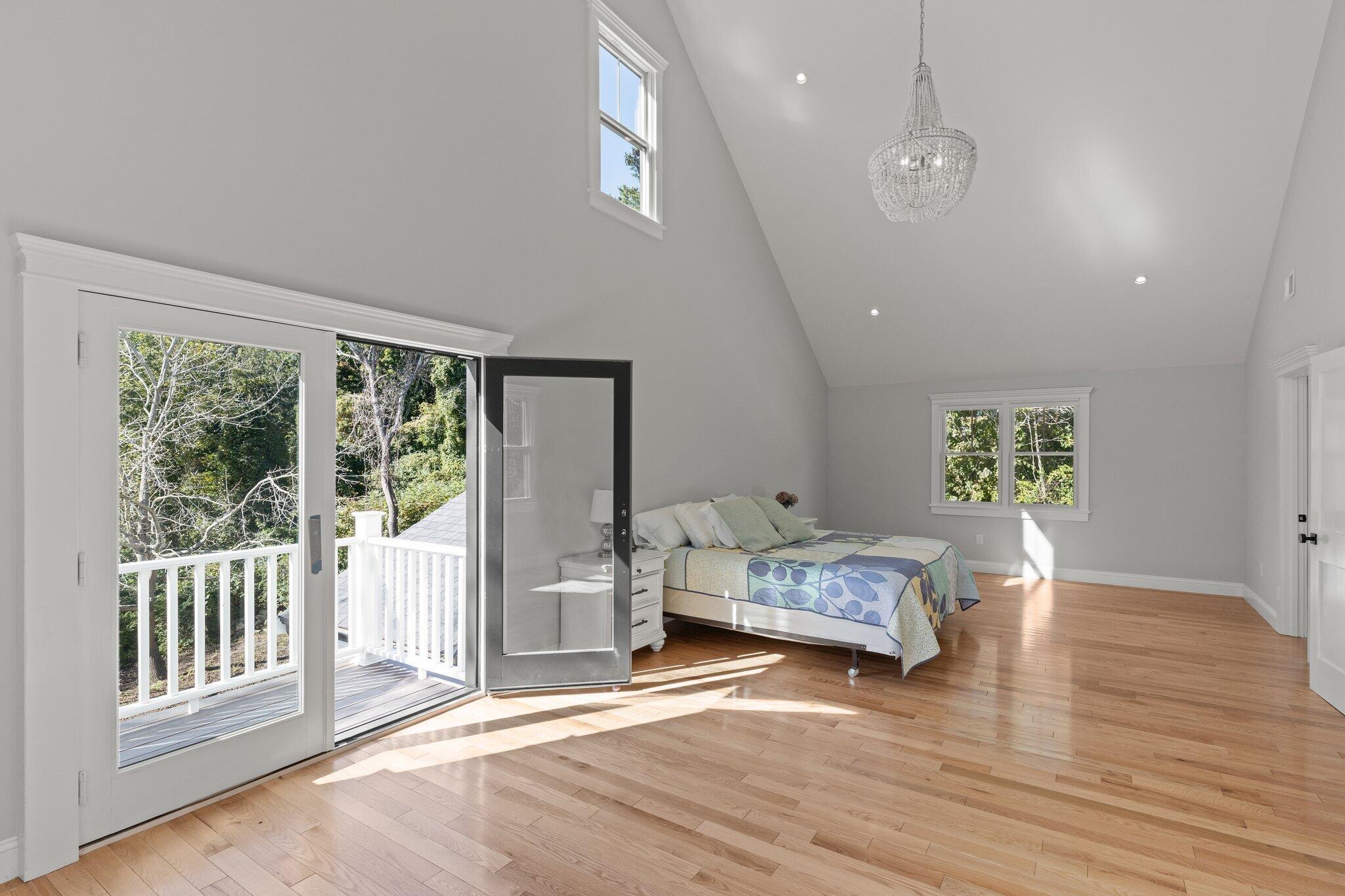 12 Jonathan Lane Sandwich, MA 02563 - Photo 32 of 57 a bedroom with furniture and large window