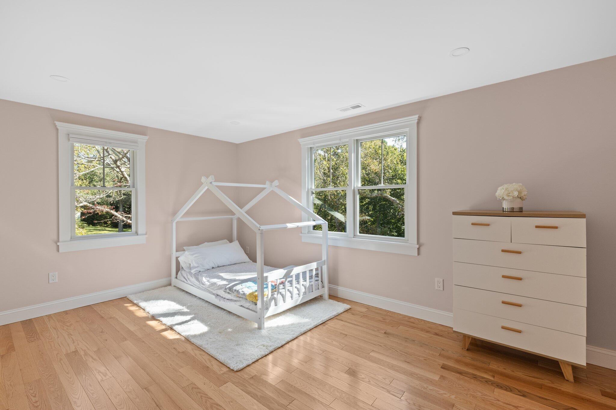 12 Jonathan Lane Sandwich, MA 02563 - Photo 44 of 57 a bedroom with a bed and a window