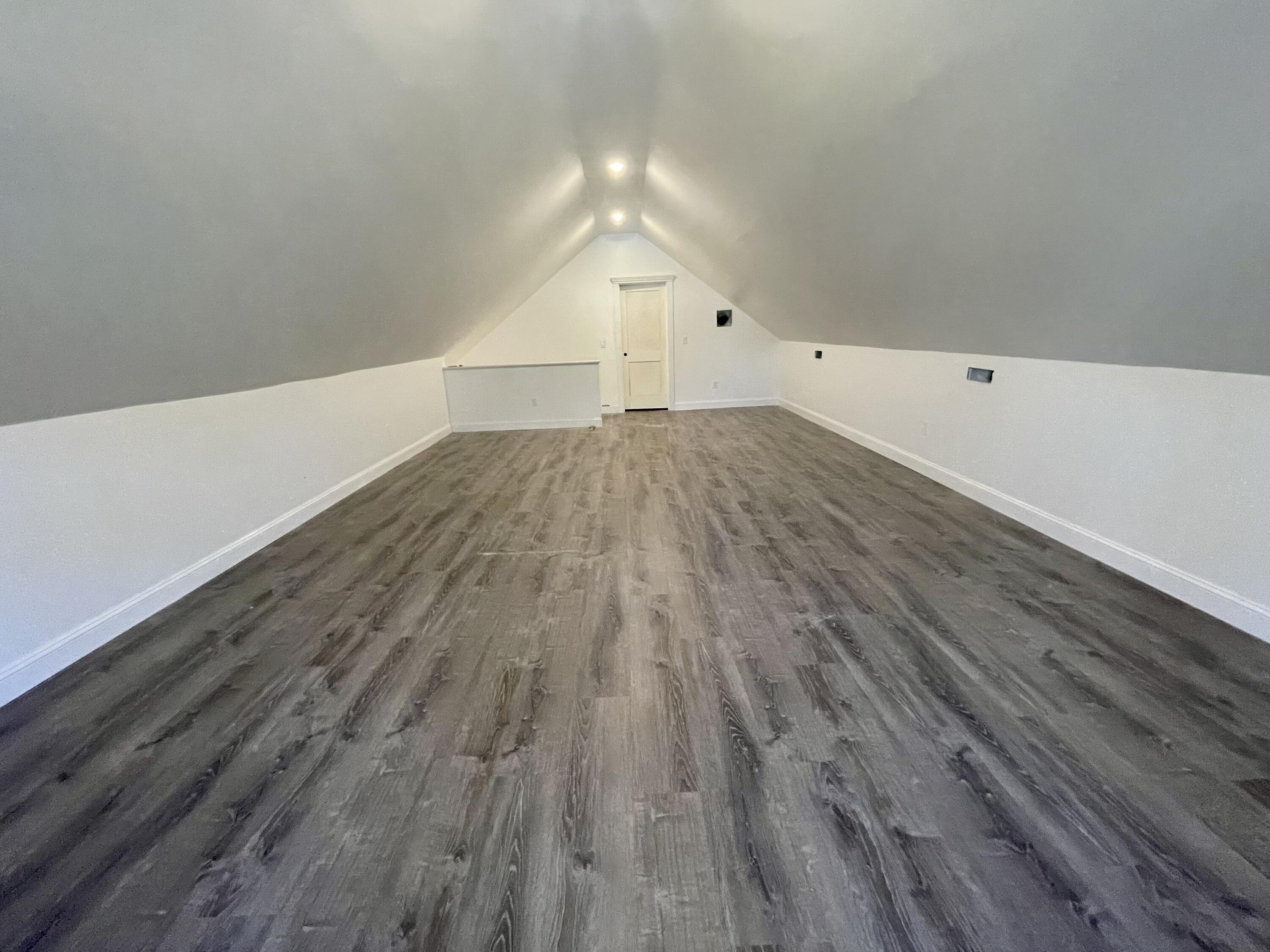 12 Jonathan Lane Sandwich, MA 02563 - Photo 45 of 57 a view of empty room with wooden floor