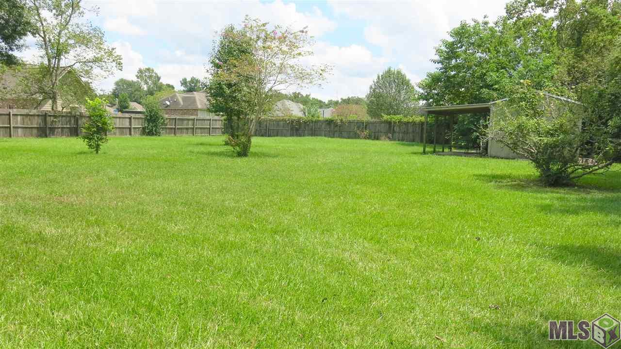 536 Staring Lane Baton Rouge, LA 70810 - Photo 18 of 21 View From Patio to Fenced Back Yard