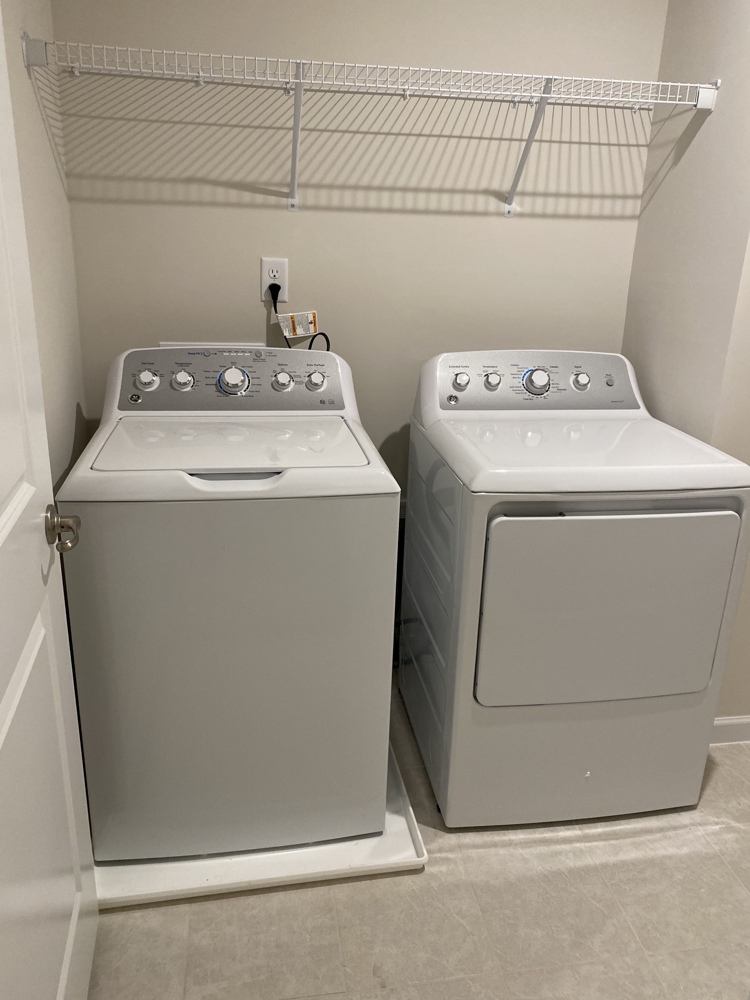 106 Keelon Gap Road, Unit 104A Spring Hill, TN 37174 - Photo 18 of 25 a utility room with dryer and washer