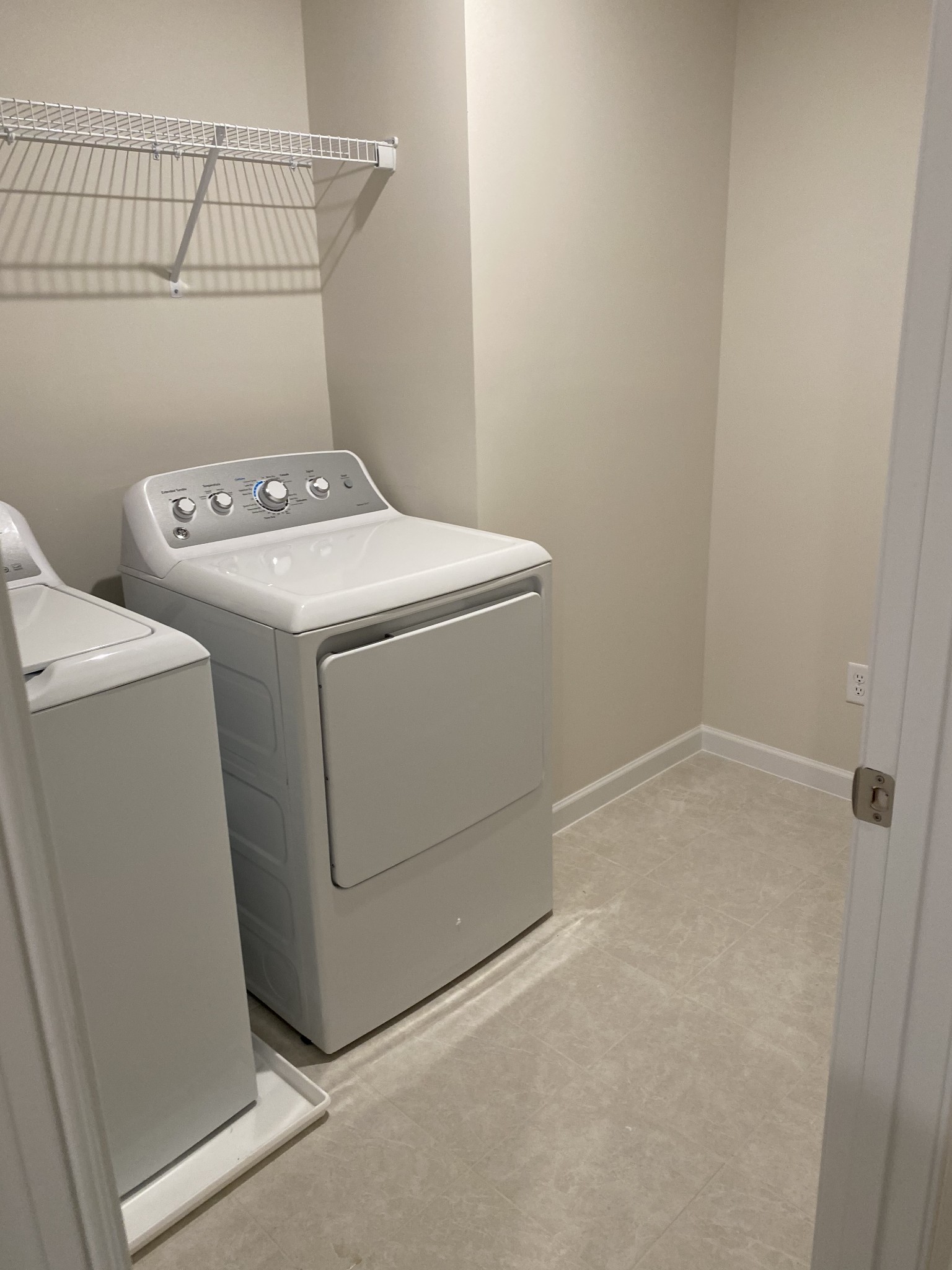 106 Keelon Gap Road, Unit 104A Spring Hill, TN 37174 - Photo 19 of 25 a utility room with dryer and washer