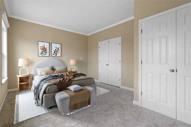 a bedroom with bed and window