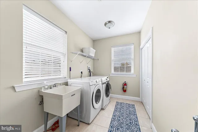 a utility room with dryer and washer