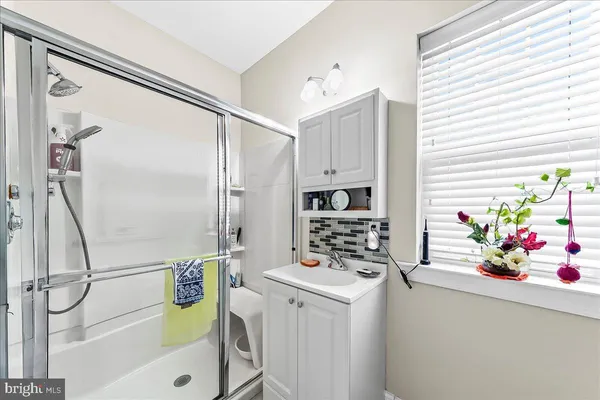 a kitchen with appliances cabinets and furniture