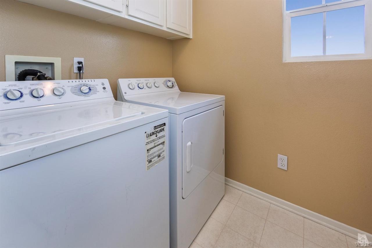 2102 Ribera Drive Oxnard, CA 93030 - Photo 17 of 18 a utility room with dryer and washer
