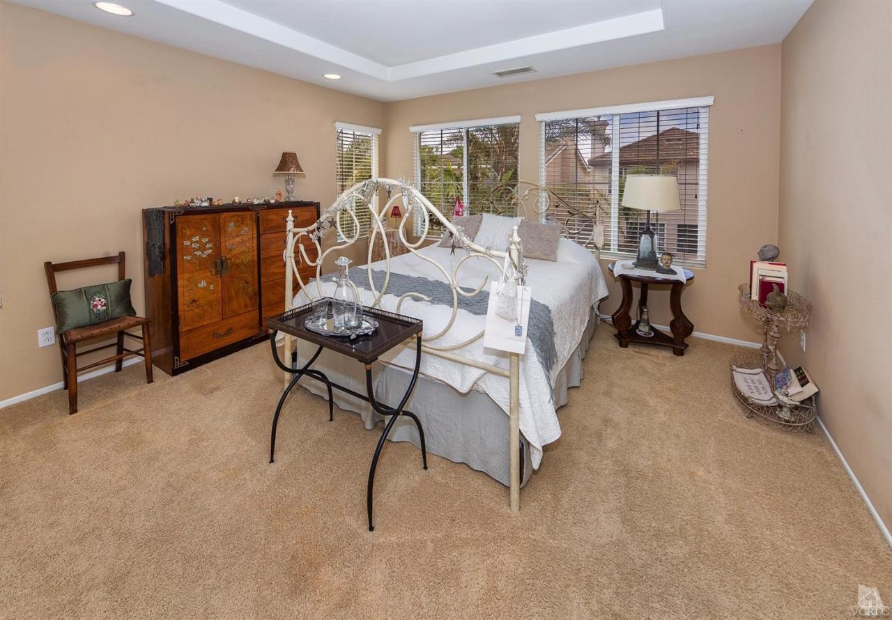2102 Ribera Drive Oxnard, CA 93030 - Photo 10 of 18 a bedroom with furniture and a window