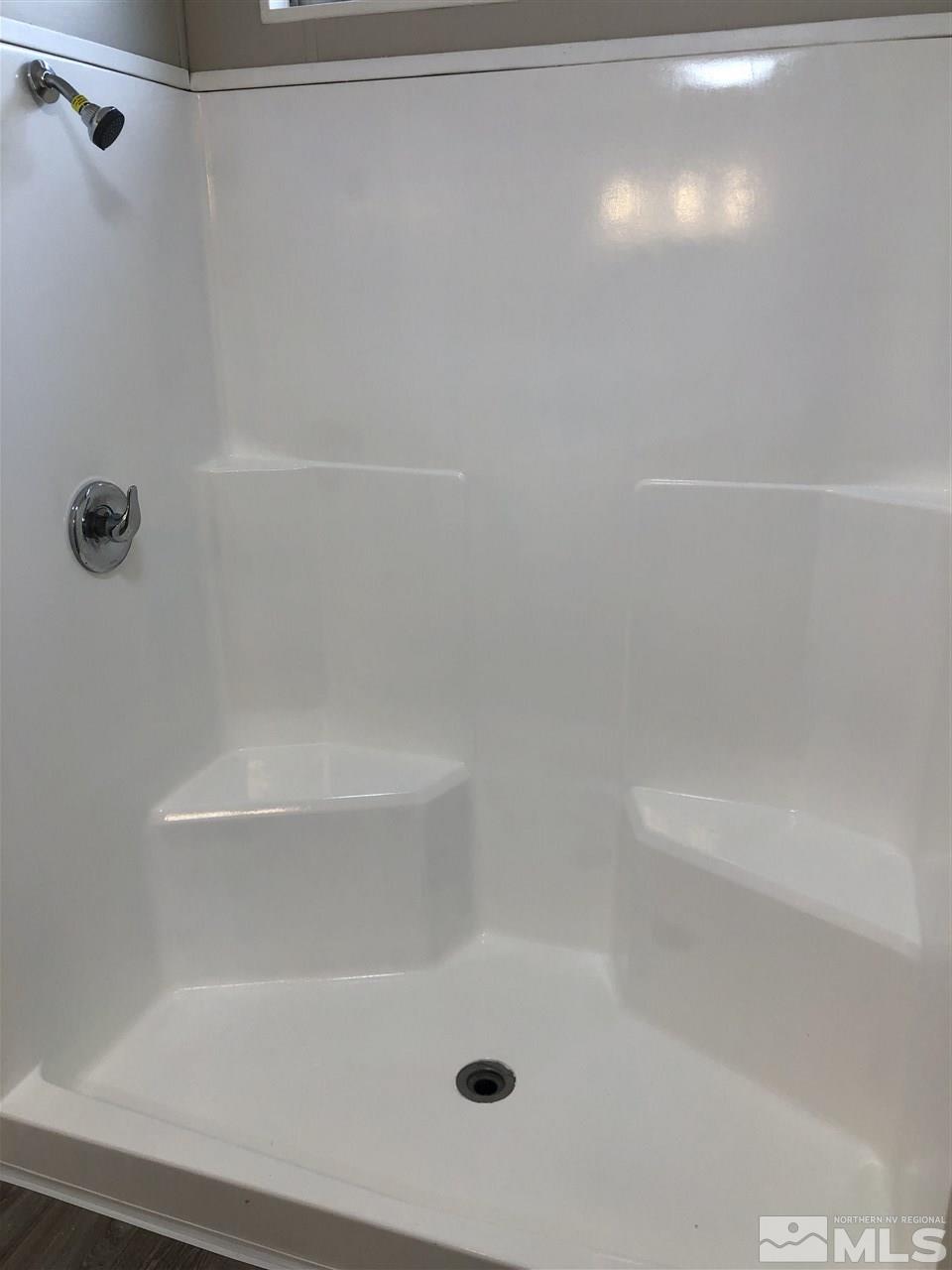 14060 Rhyolite Circle, Unit 89521 Reno, NV 89521 - Photo 14 of 18 a close up of a bathtub