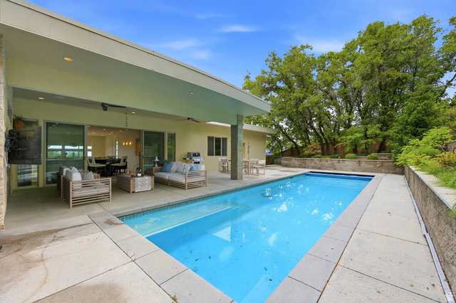 1389 Millbrook Way Bountiful, UT 84010 - Photo 3 of 74 Rectangular swimming pool with integrated spa and surrounding concrete patio