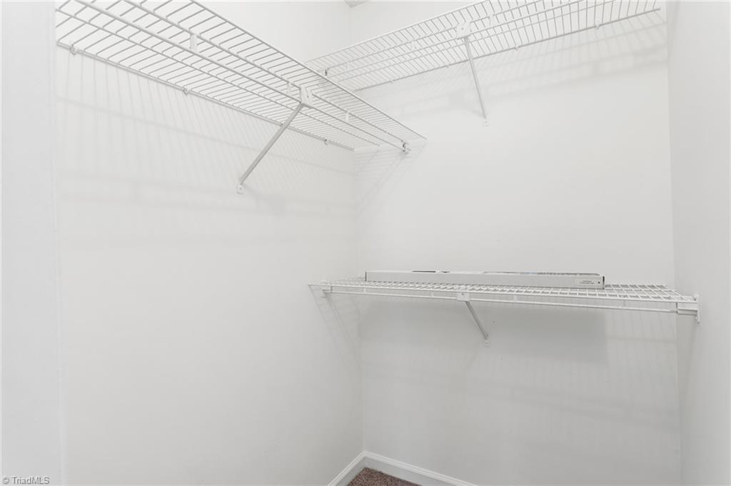 3109 Darden Road, Unit F Greensboro, NC 27407 - Photo 17 of 23 primary walk-in closet