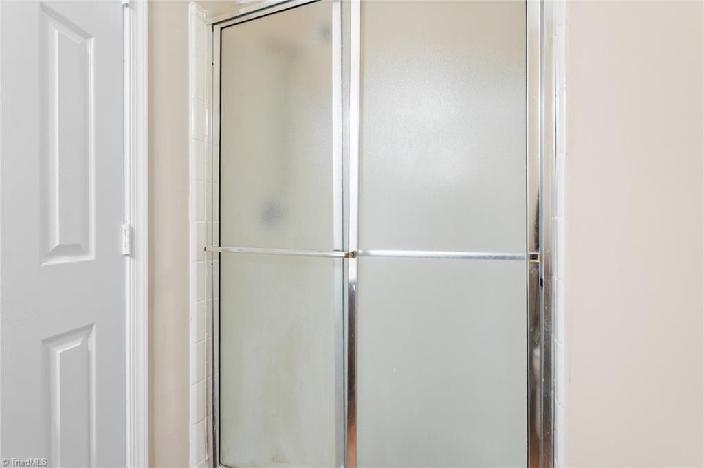 3109 Darden Road, Unit F Greensboro, NC 27407 - Photo 19 of 23 primary en-suite bathroom