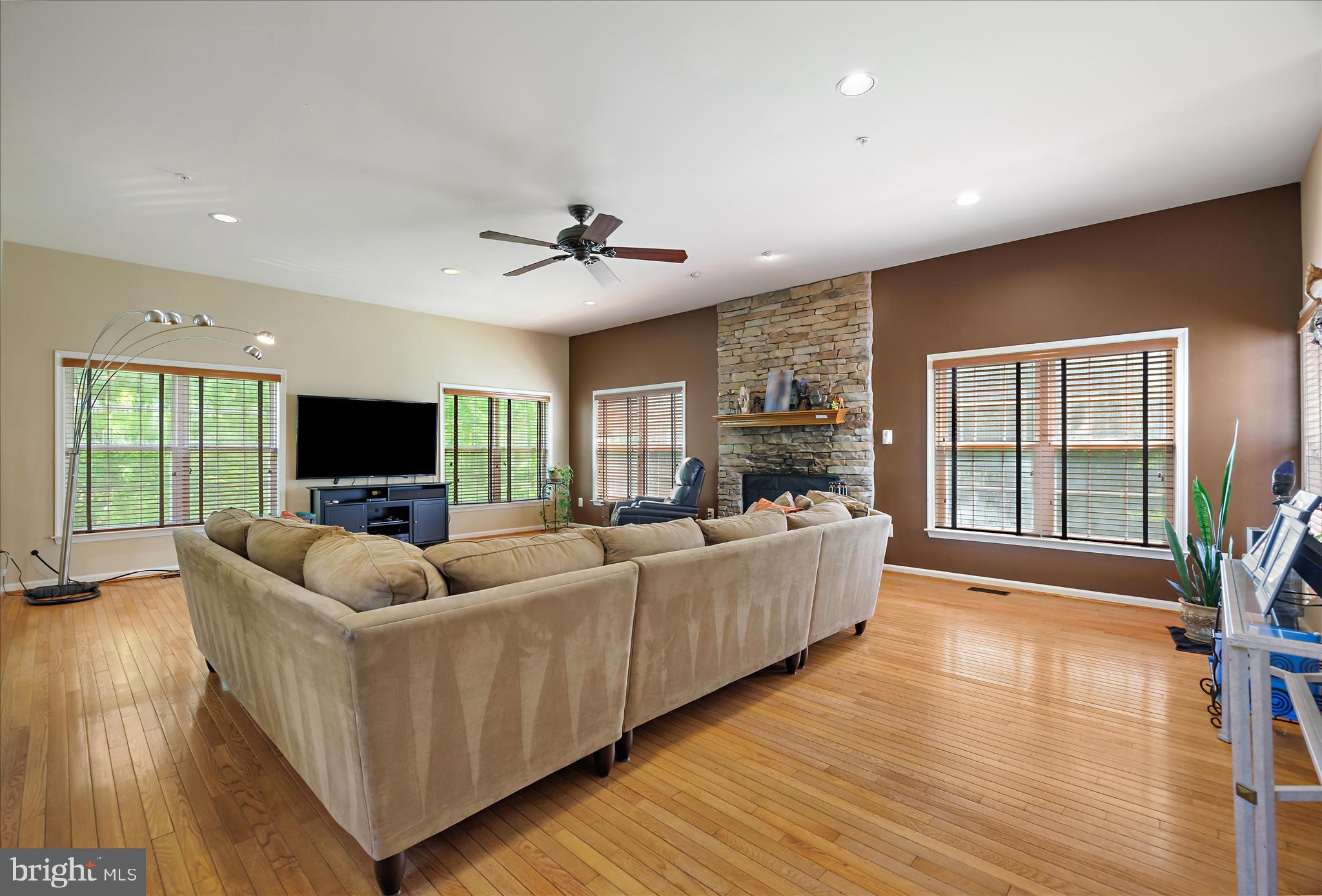 3303 Dunwood Ridge Terrace Bowie, MD 20721 - Photo 23 of 76 Sunken Family Room, hardwood floors, fireplace