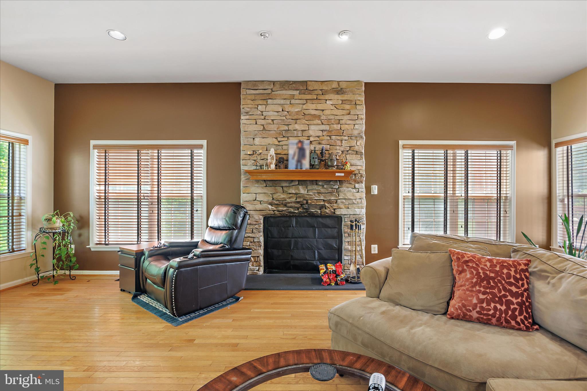 3303 Dunwood Ridge Terrace Bowie, MD 20721 - Photo 26 of 76 Brick fireplace anchors Family Room