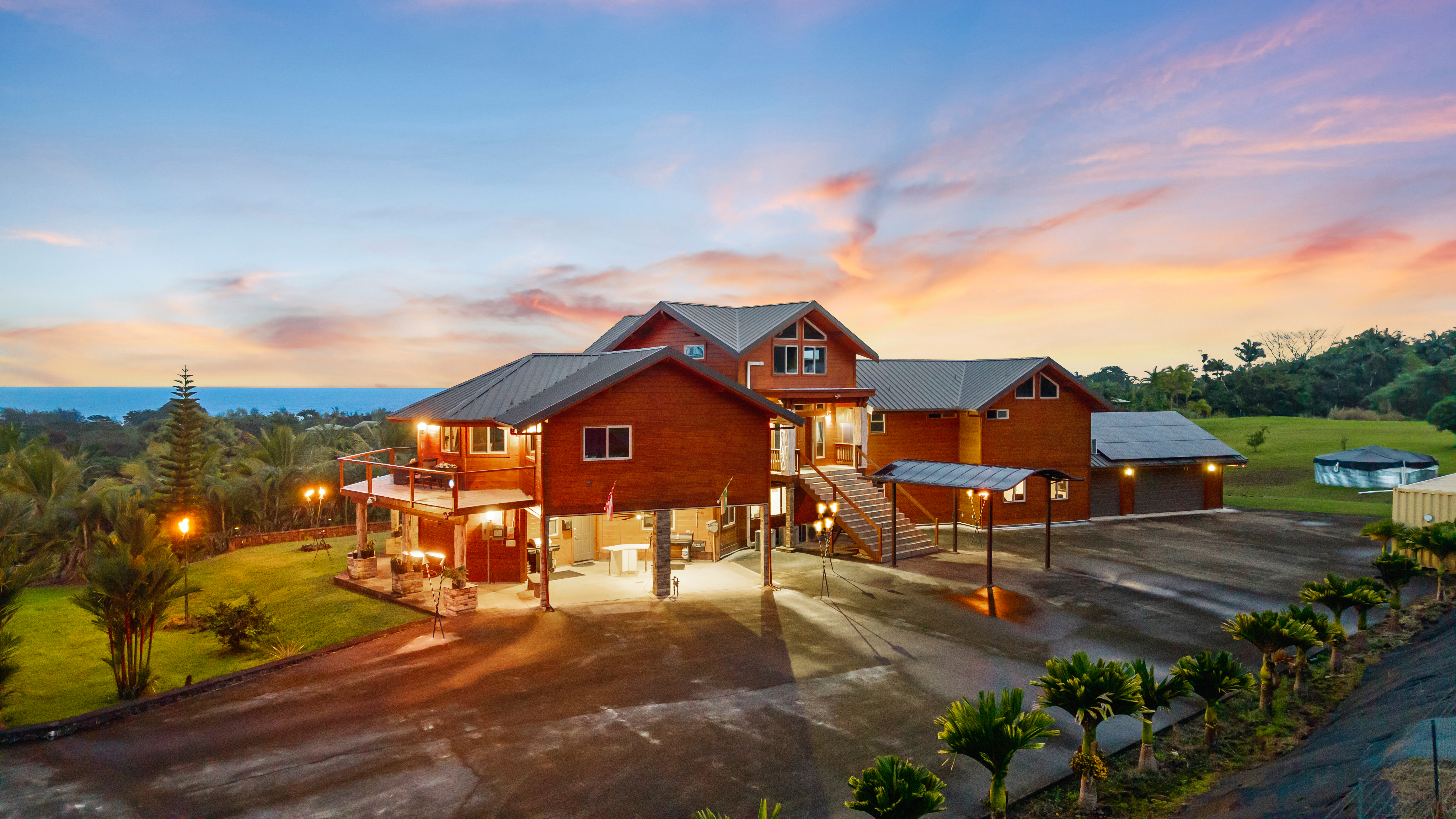 28-425 Overpass Road Pepeekeo, HI 96783 - Photo 1 of 30 a view of a house with a yard