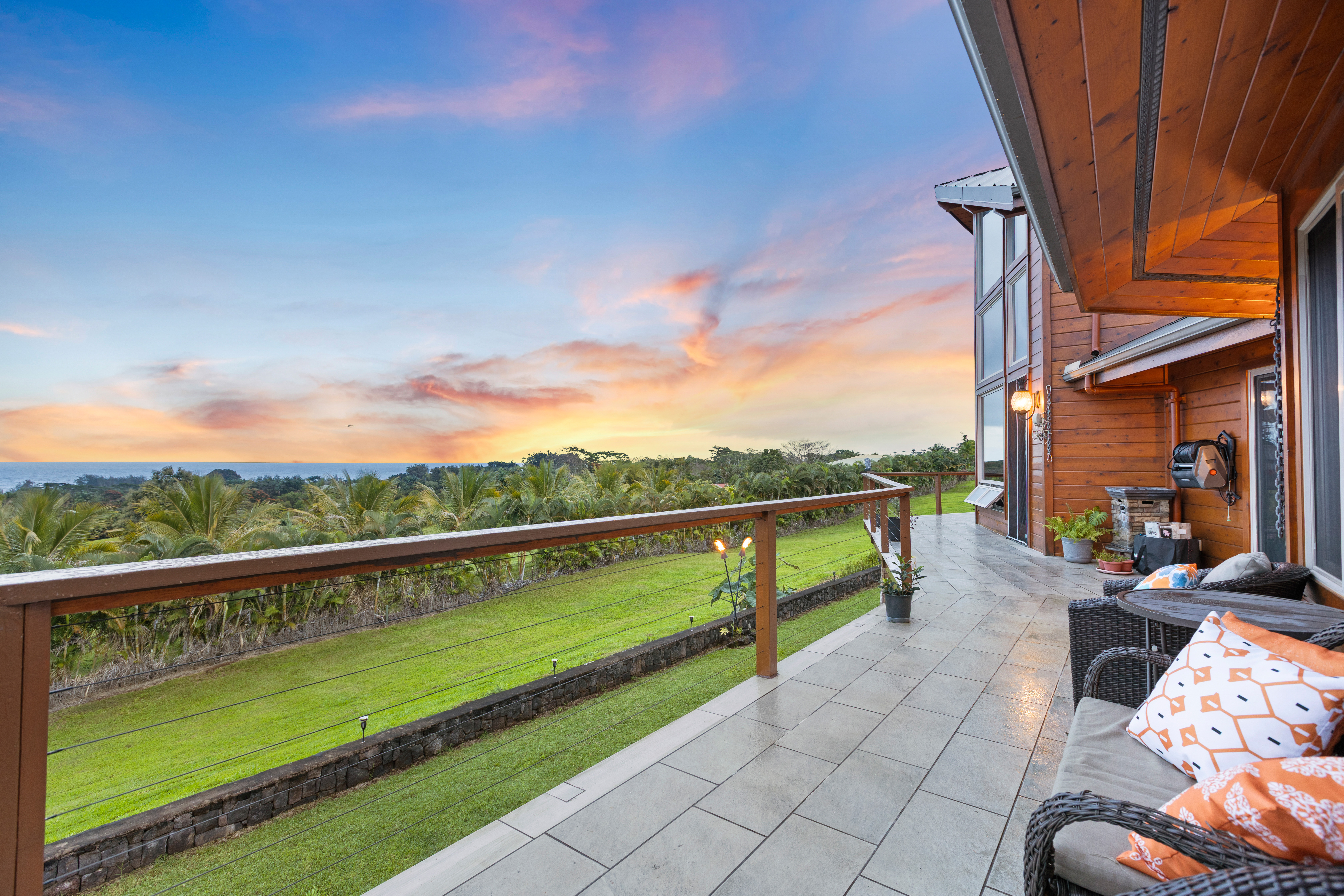28-425 Overpass Road Pepeekeo, HI 96783 - Photo 14 of 30 a view of city from balcony with seating space