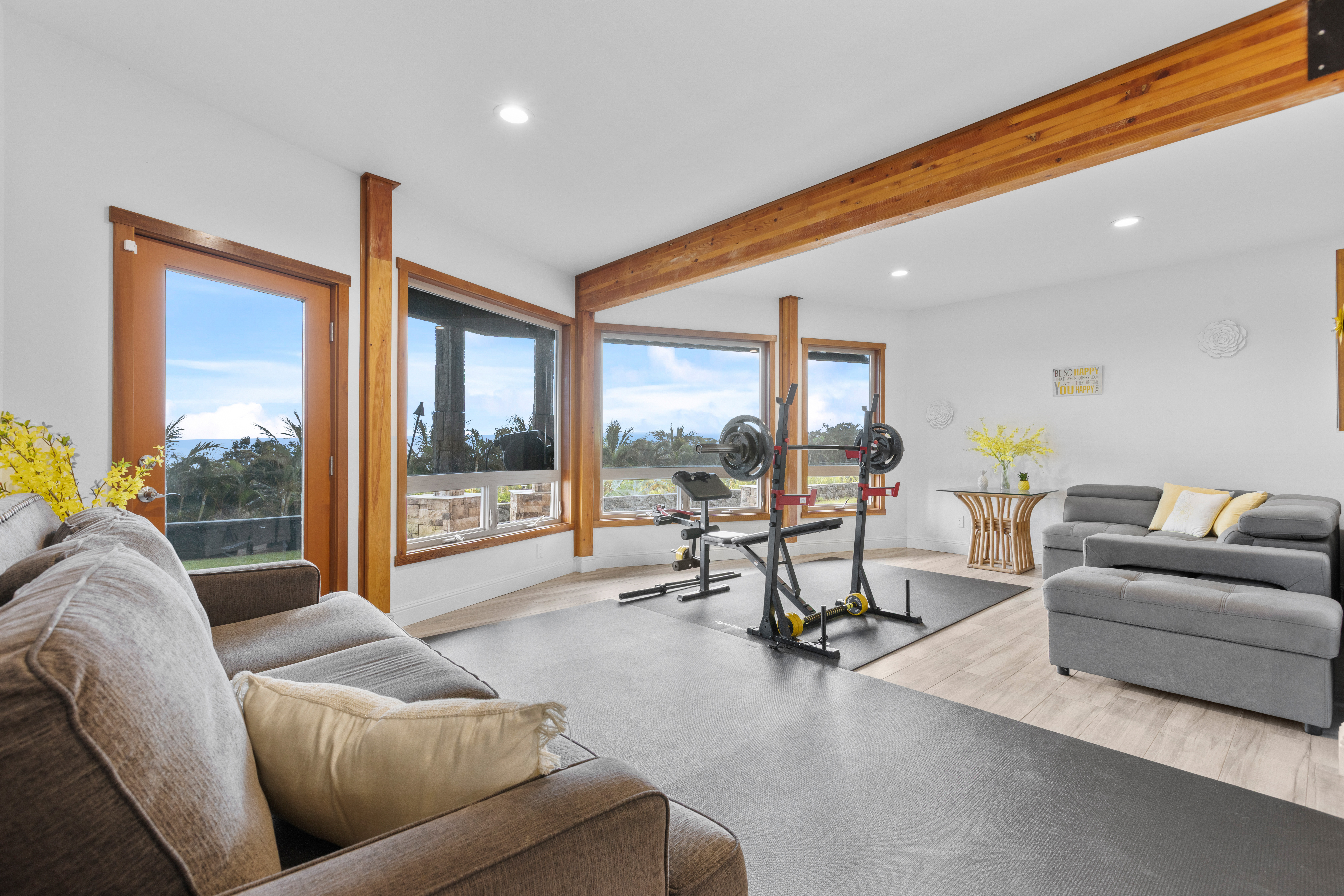 28-425 Overpass Road Pepeekeo, HI 96783 - Photo 19 of 30 a living room with furniture and a large window