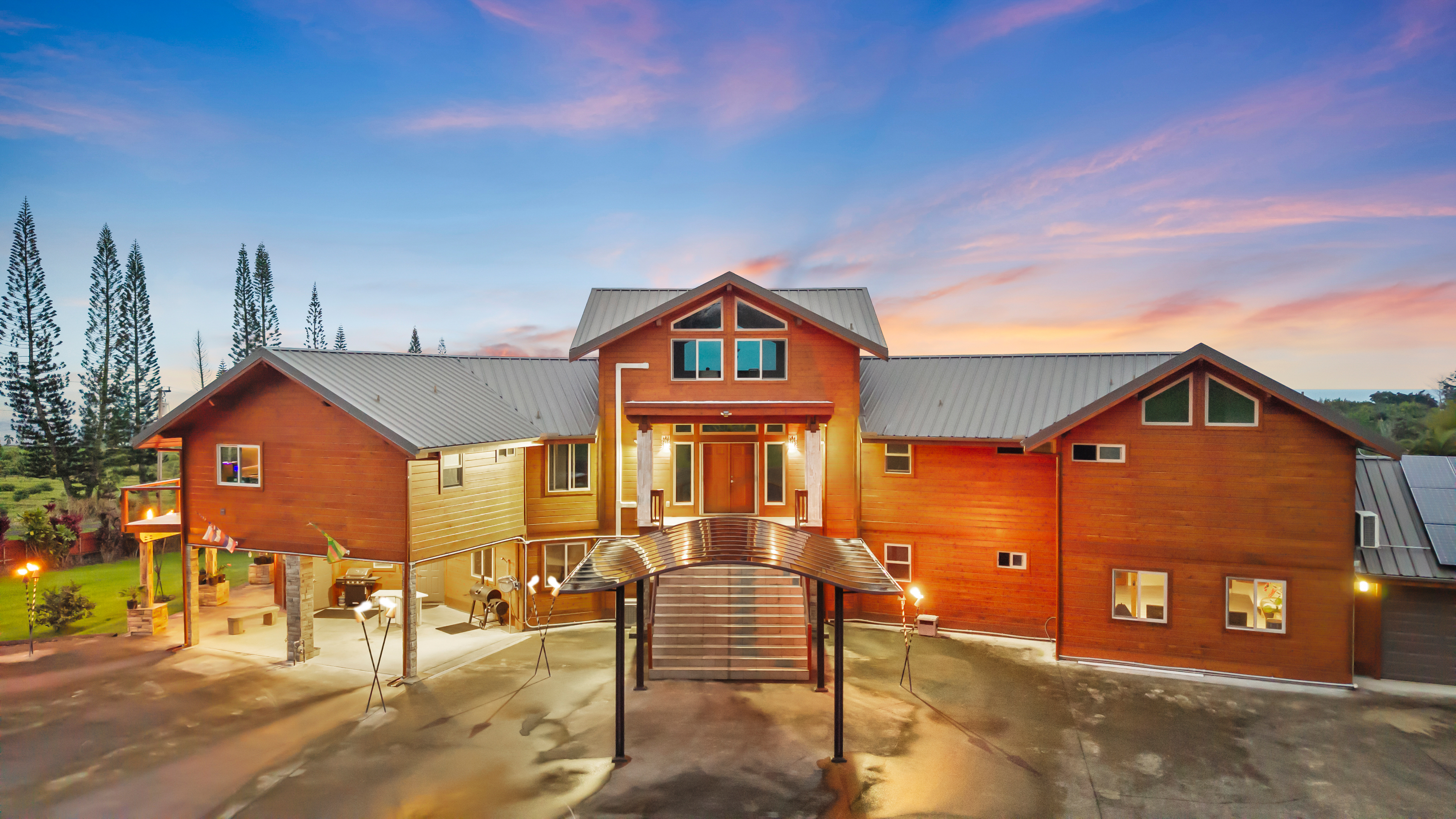 28-425 Overpass Road Pepeekeo, HI 96783 - Photo 3 of 30 a front view of a house with a yard