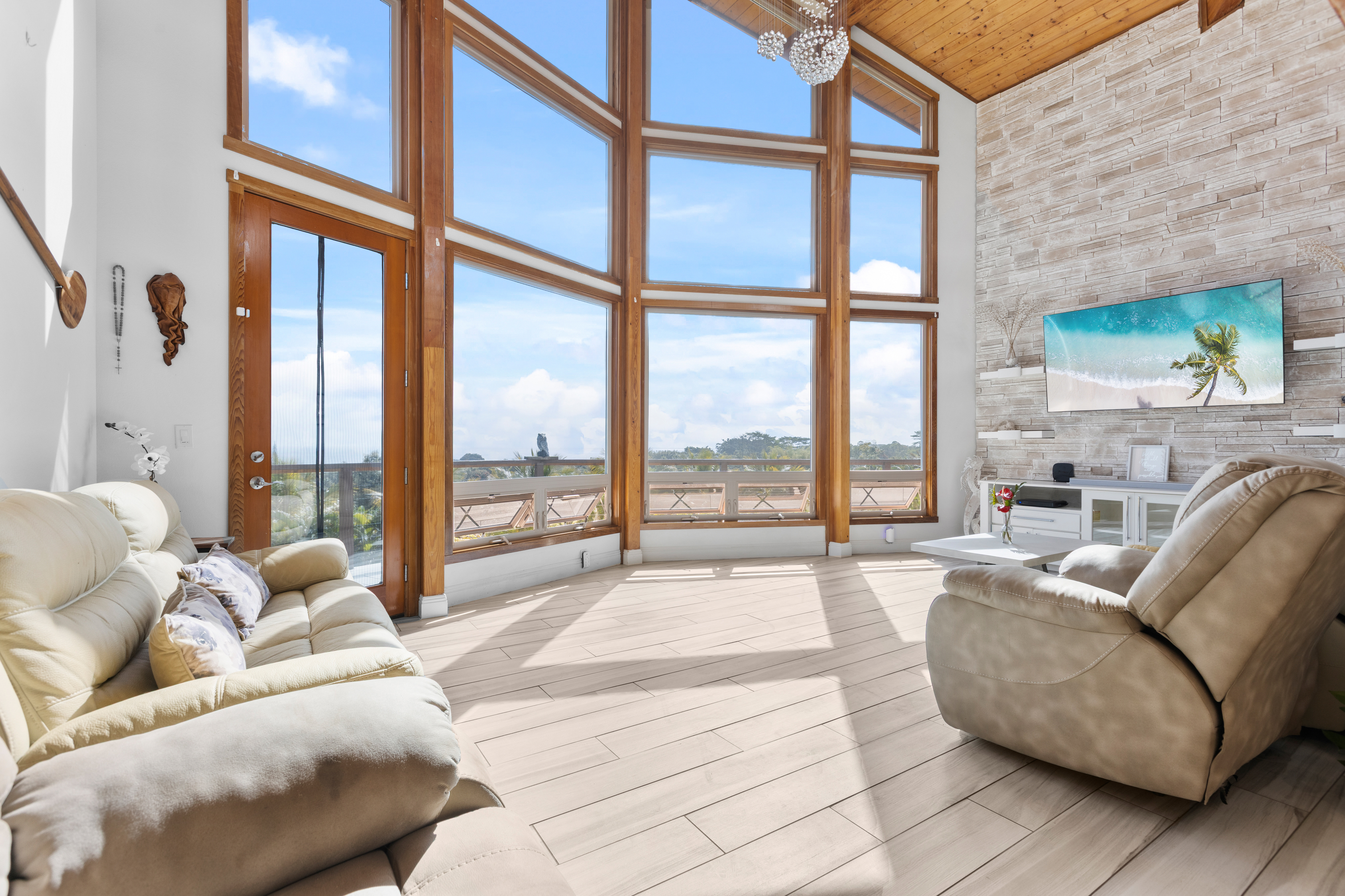 28-425 Overpass Road Pepeekeo, HI 96783 - Photo 8 of 30 a living room with furniture and a large window