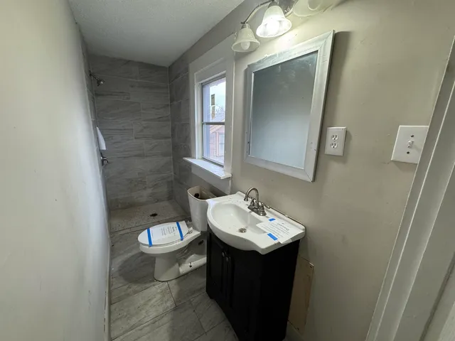 a view of wooden floor with stairs