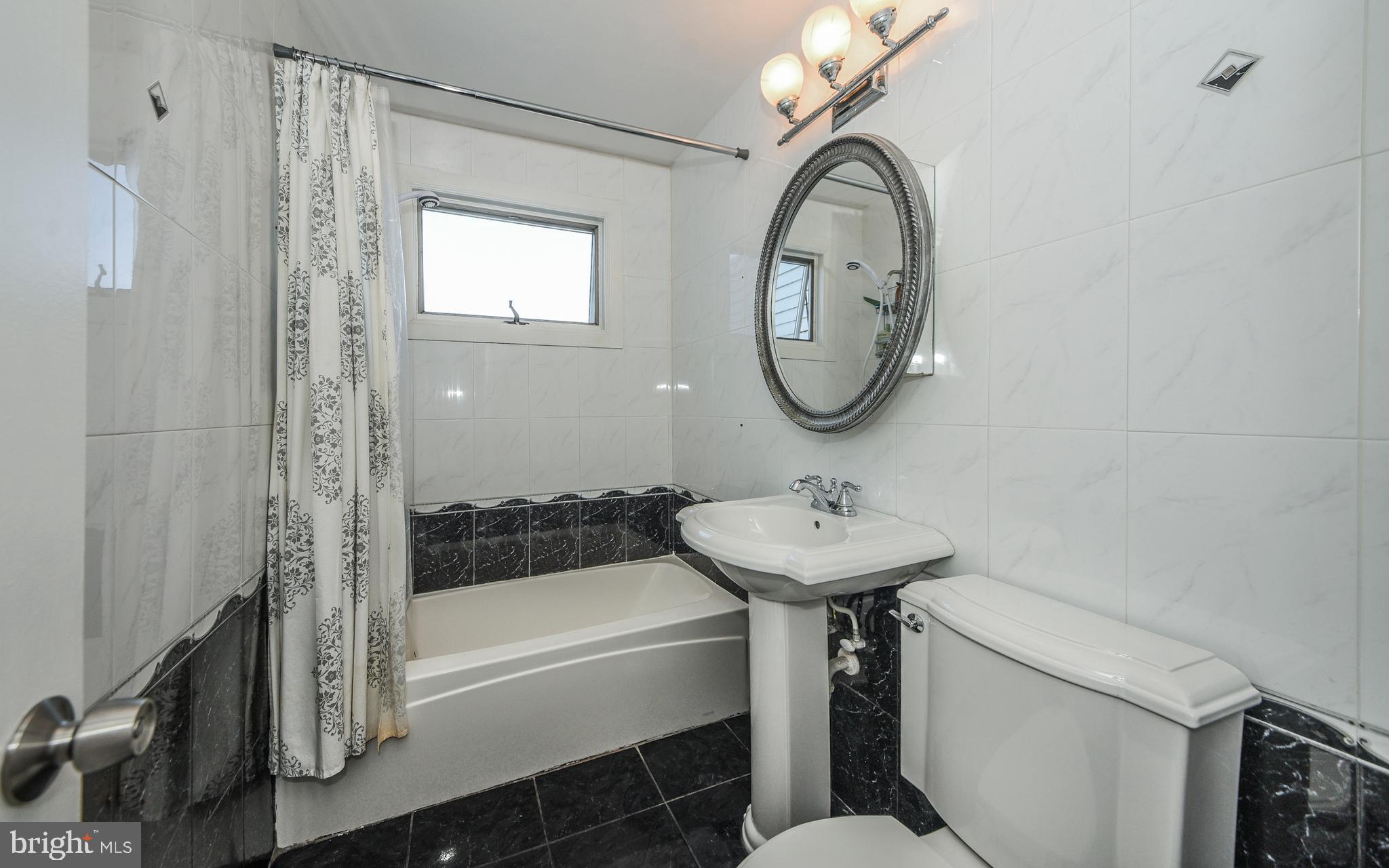 1418 Hallman Road Abington, PA 19001 - Photo 21 of 27 Full Hall Bathroom