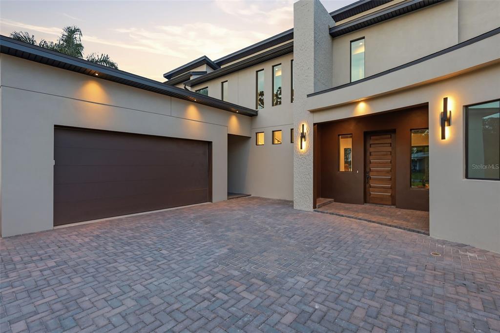 1615 Cole Road Orlando, FL 32803 - Photo 2 of 31 a view of a house with a garage