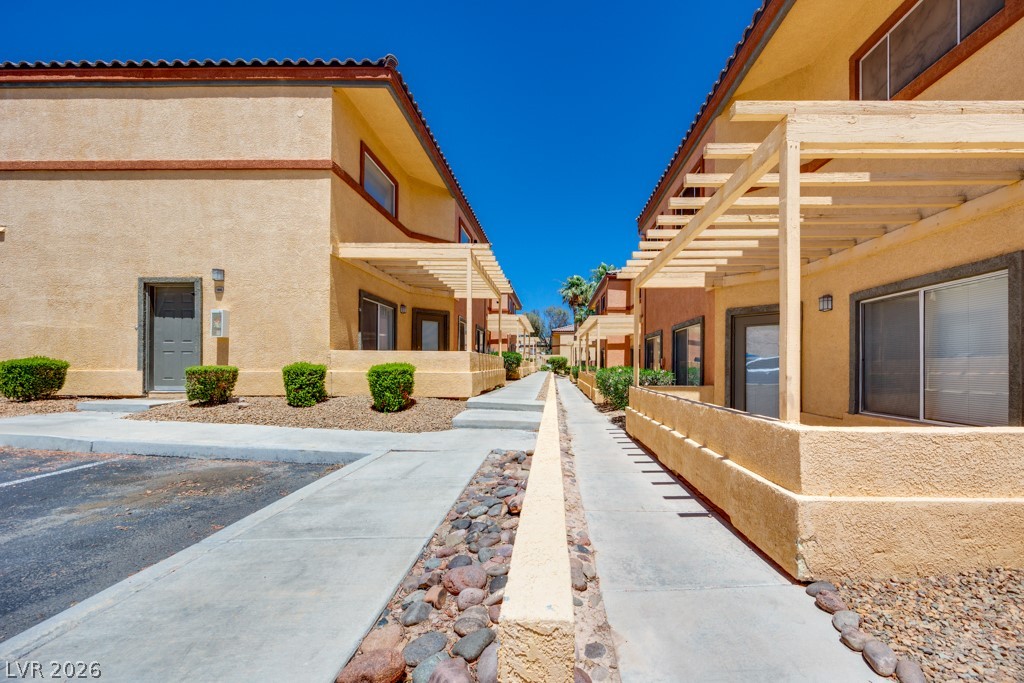 4915 East Russell Road, Unit 127 Las Vegas, NV 89120 - Photo 19 of 19 Sun-kissed facades with private entrances define these inviting residences.