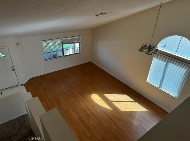 a view of an empty room and window