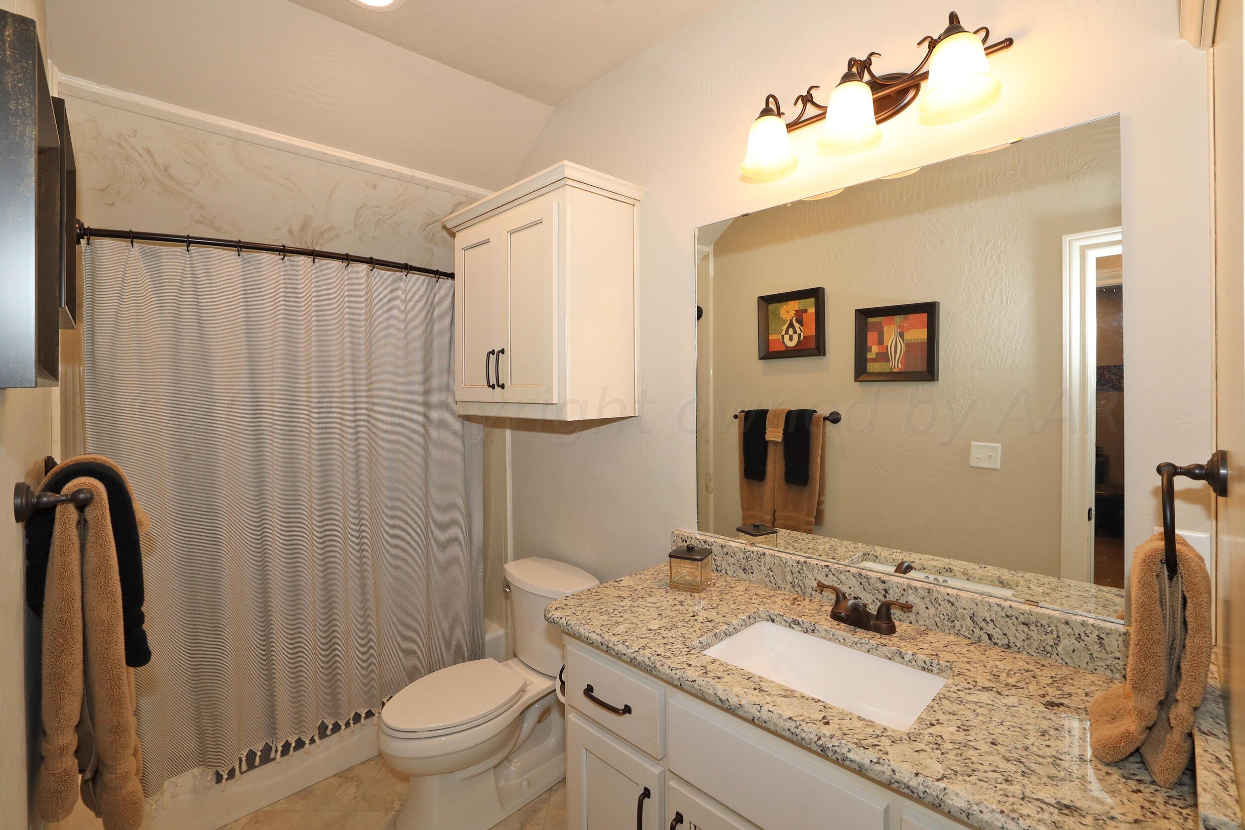 5908 Wesley Road Amarillo, TX 79119 - Photo 25 of 30 Upstairs Bathroom
