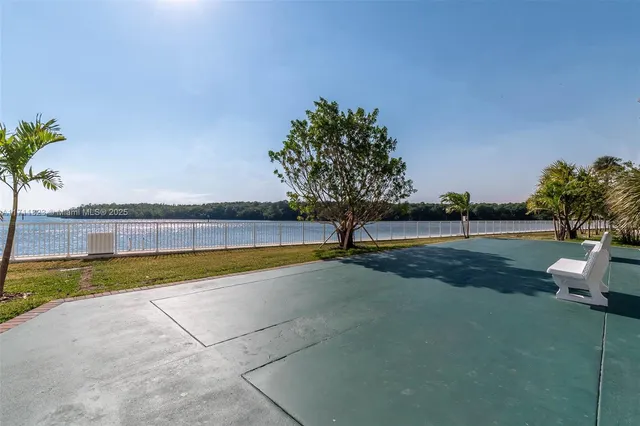 a view of swimming pool with outdoor space and sitting area