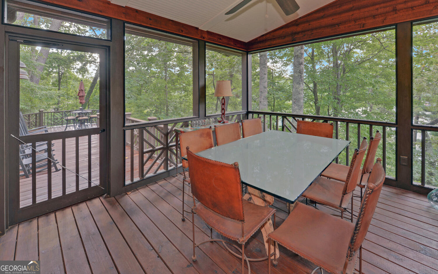 3540 Lake Rabun Road Lakemont, GA 30552 - Photo 22 of 81 a view of a dining room with furniture window and wooden floor