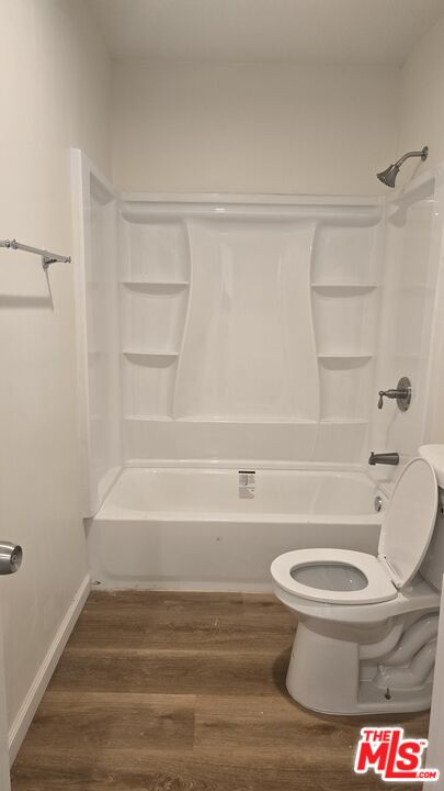 4150 West Pico Boulevard Los Angeles, CA 90019 - Photo 5 of 6 a bathroom with a toilet and a shower