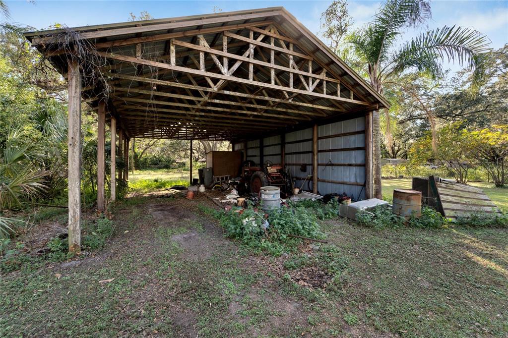 5030 Sydney Road Plant City, FL 33566 - Photo 12 of 23 a view of back yard of the house