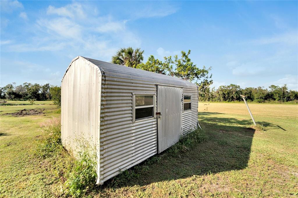 5030 Sydney Road Plant City, FL 33566 - Photo 13 of 23 a view of a swimming pool with an outdoor space