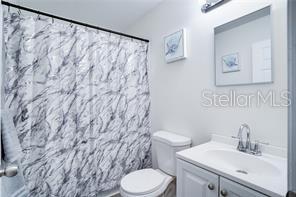 3916 Broad Street Seffner, FL 33584 - Photo 8 of 9 a bathroom with a sink and a toilet