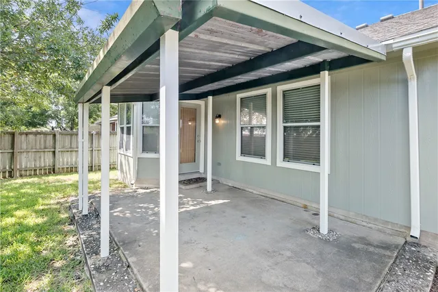 a view of a backyard with a garden