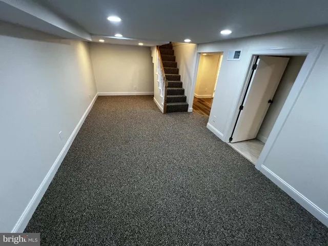 en empty room with windows