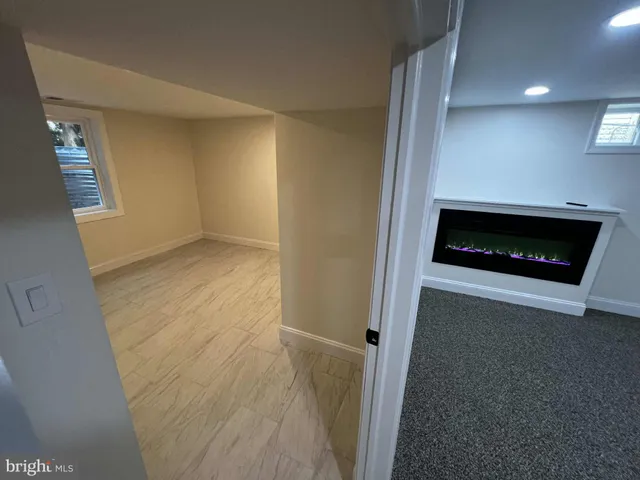 a view of house with backyard