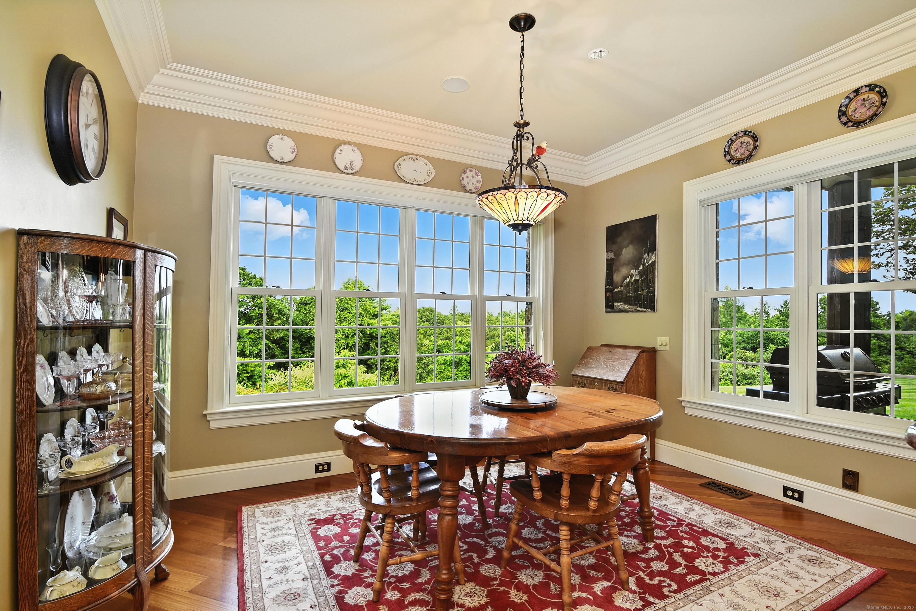 282 Searles Road Pomfret, CT 06259 - Photo 28 of 40 The morning room affords sunrise views through the 4 double-hung windows and is open to the kitchen and great room.
