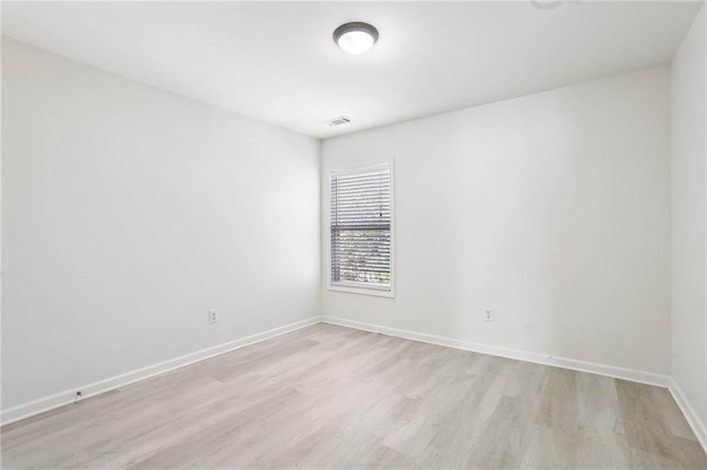5940 Bentley Way Cumming, GA 30040 - Photo 18 of 39 a view of an empty room