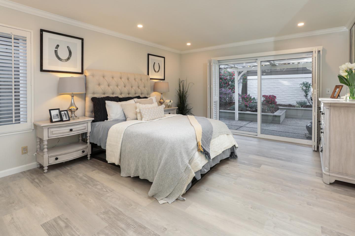 4057 Ashbrook Circle San Jose, CA 95124 - Photo 13 of 15 a bedroom with a bed and a large window