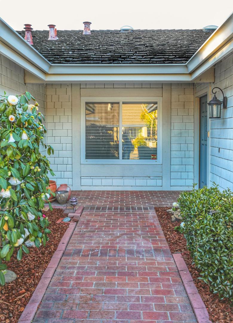 4057 Ashbrook Circle San Jose, CA 95124 - Photo 15 of 15 a view of a pathway both side of house