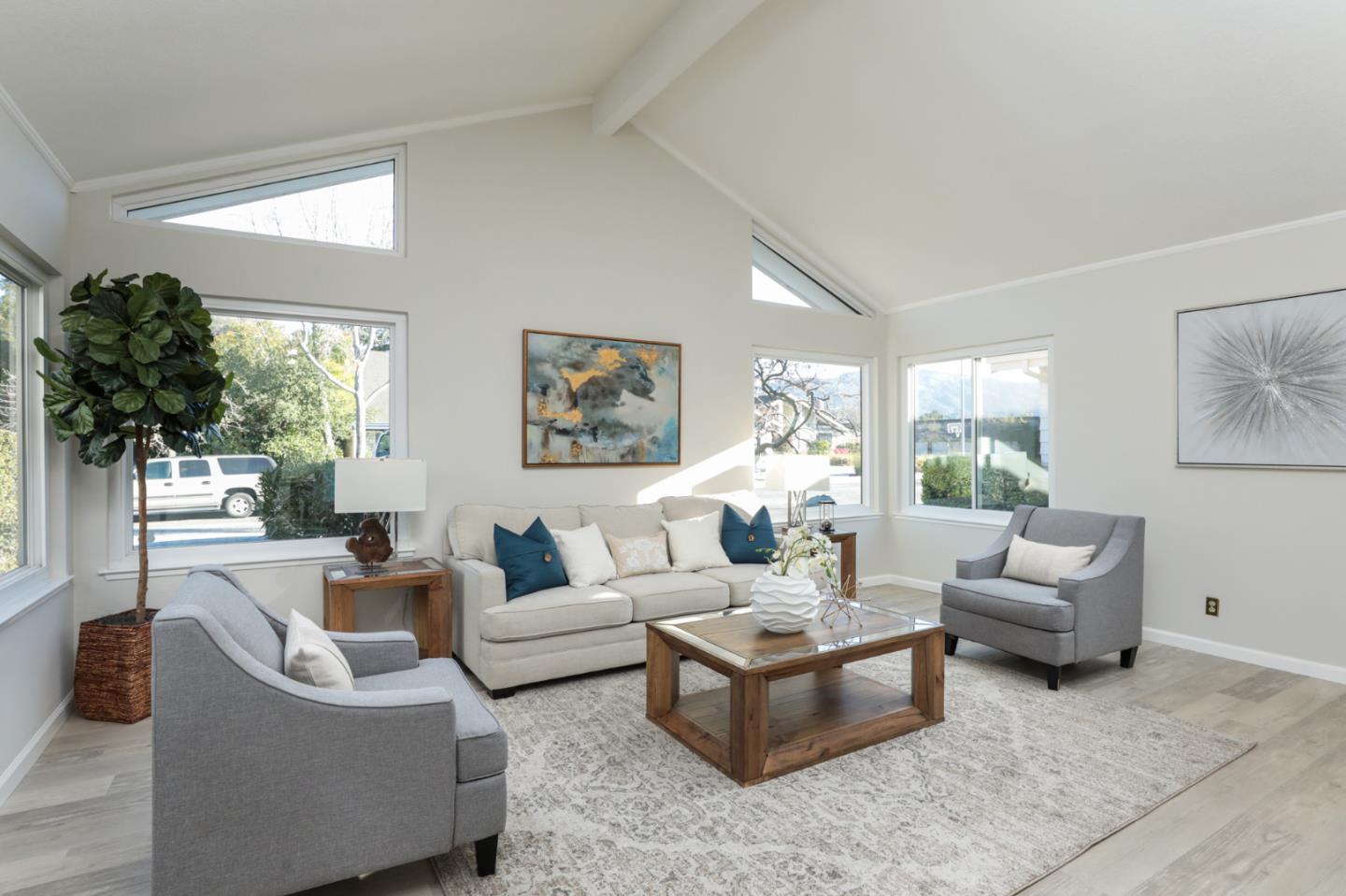 4057 Ashbrook Circle San Jose, CA 95124 - Photo 2 of 15 a living room with furniture and a large window