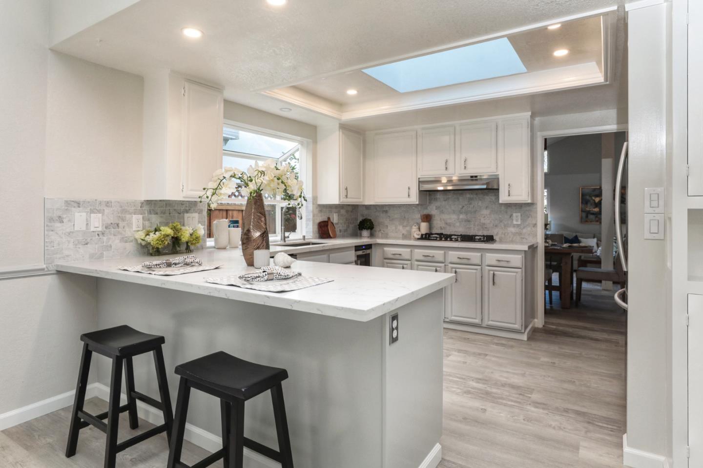4057 Ashbrook Circle San Jose, CA 95124 - Photo 7 of 15 a kitchen with counter top space cabinets and appliances