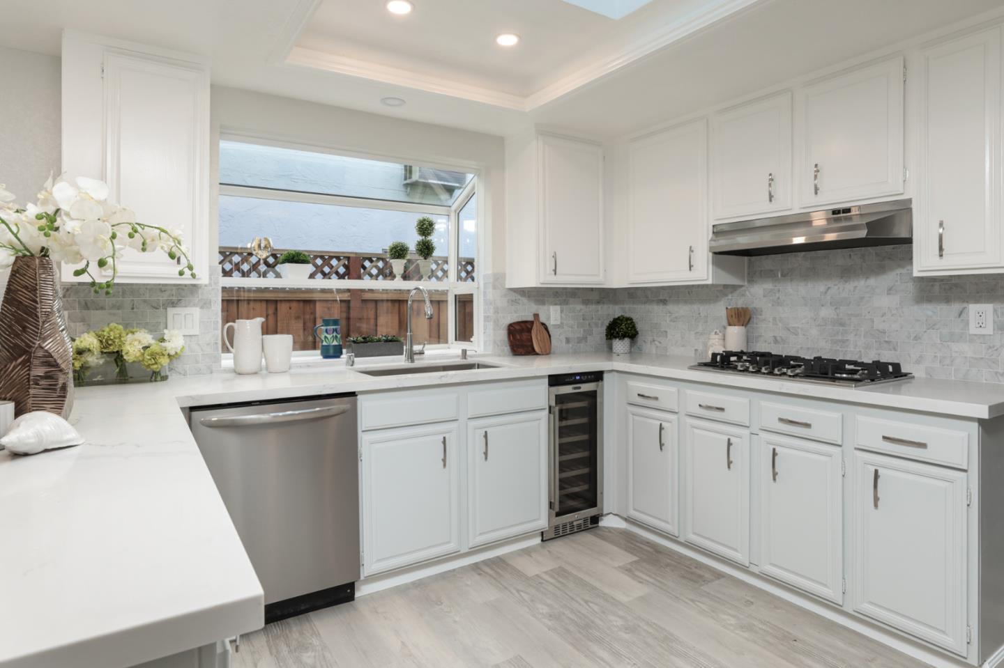 4057 Ashbrook Circle San Jose, CA 95124 - Photo 8 of 15 a kitchen with sink and cabinets
